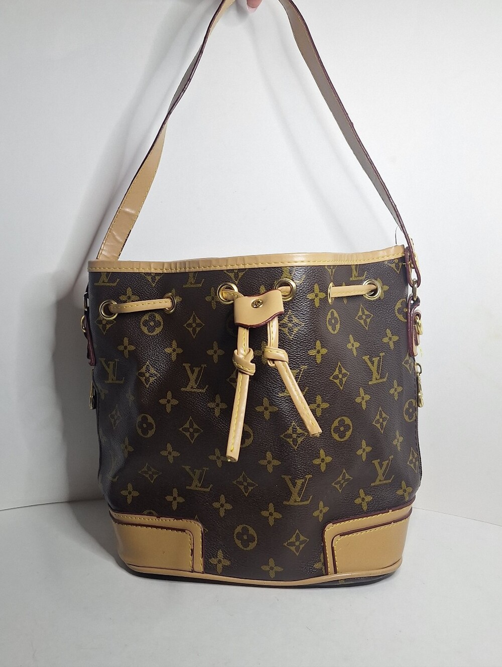 Brown Faux Leather Bucket Shoulder Bag Tan Lining with cute monogram pattern
